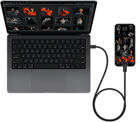 iPhone 15 Pro Max เชื่อมต่อกับ MacBook Pro รุ่น 14 นิ้ว พร้อม USB-C