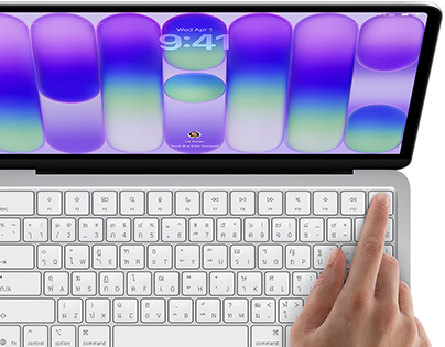 MacBook Neo, สีเงิน, แสดงหน้าจอการเข้าสู่ระบบ, นิ้วของบุคคลวางอยู่บนเซ็นเซอร์ Touch ID ที่มุมขวาบนของคีย์บอร์ด